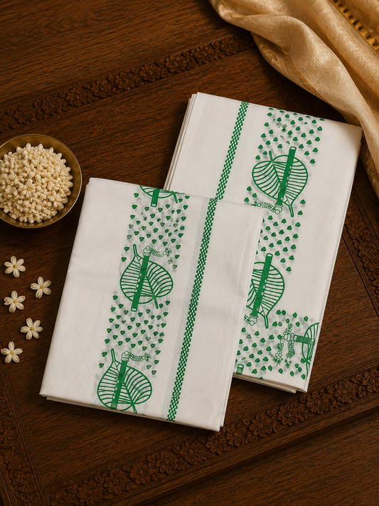 Off-white Kasavu cotton Set Mundu with green Krishna flute and leaf block prints by Saree from Thambai, styled for Janmashtami, temple visits, and traditional occasions.