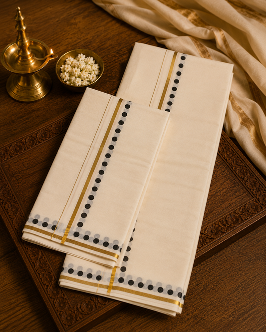 Off-white Kasavu cotton Set Mundu with golden tissue zari lines and black dot border details by Saree from Thambai, crafted for Onam, Vishu, or temple ceremonies.
