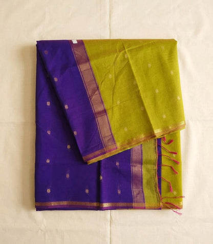 Purple and green maheswari cotton saree from saree from thambai with a plain background