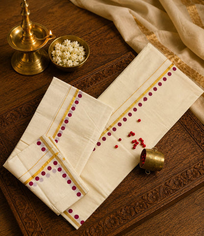Off-white Kasavu cotton Set Mundu featuring golden tissue border stripes and maroon dot accents by Saree from Thambai, crafted for Onam, Vishu, or temple wear.
