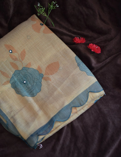 organza cotton saree with floral design on a dark background