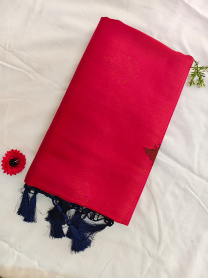 soft silk blend saree  with blue tassles  on a white background